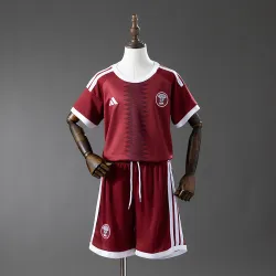 World Cup 2026 Qatar home kids kit front view, featuring team crest.