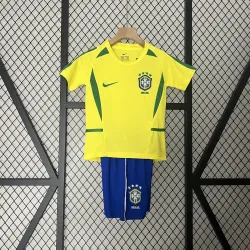 2002 World Cup Brazil Home Retro Kids Kit - product photo 2002 World Cup Brazil Home Retro Kids Kit front view, classic yellow design.