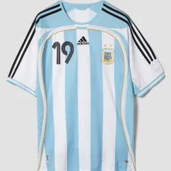 Argentina 2006 World Cup Retro Jersey MESSI #19 Home - product photo Front view of the Messi Argentina jersey, a classic 2006 World Cup football shirt.