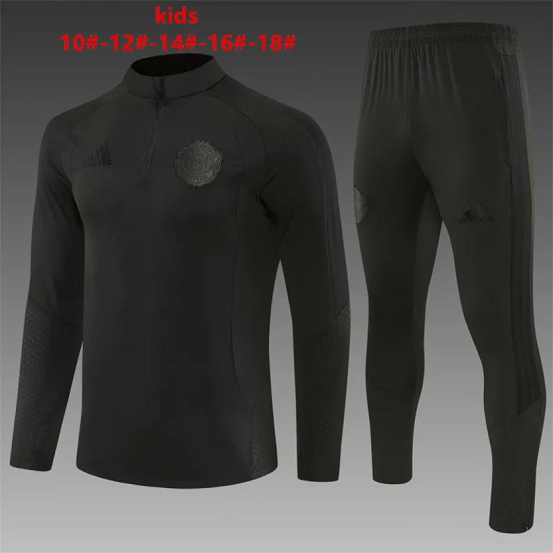 26/27 Manchester United All Black Kids Half-zip Tracksuit