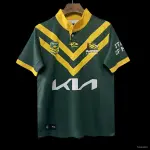 Maglia dei Kangaroos australiani 2026, verde con chevron a V dorato Maglia dei Kangaroos australiani 2026, verde con motivo a V dorato
