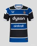 Maglia Bath Rugby 25/26 blu con cerchi bianchi e neri.