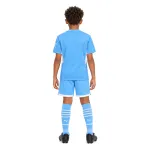 21/22 Manchester City Home Kids Kit — AI model preview, full-body back view; socks optional