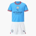 22/23 Manchester City Home Kids Kit 22/23 Manchester City Home Kids Kit — AI-generated product preview, front view