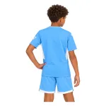 21/22 Manchester City Home Kids Kit — AI model preview, upper-body back view; socks optional