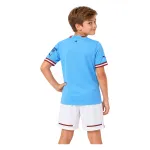 22/23 Manchester City Home Kids Kit — AI model preview, upper-body back view; socks optional