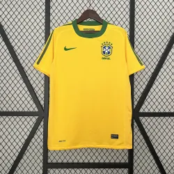 2010 World Cup Brazil Retro Home yellow soccer jersey - product photo 2010 World Cup Brazil Retro Home yellow Men's soccer jersey, front with crest detail.