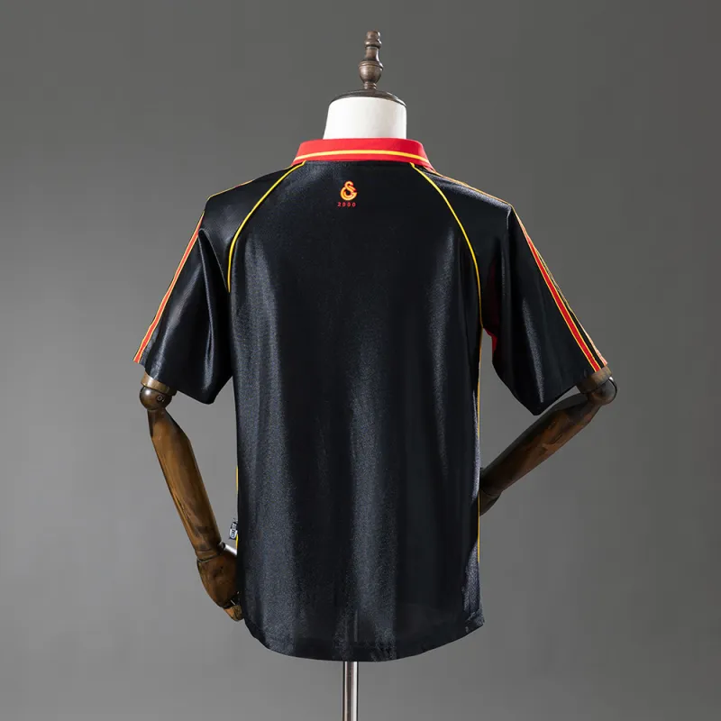 Camisola de futebol retro do Galatasaray Terceira Fora 99/00